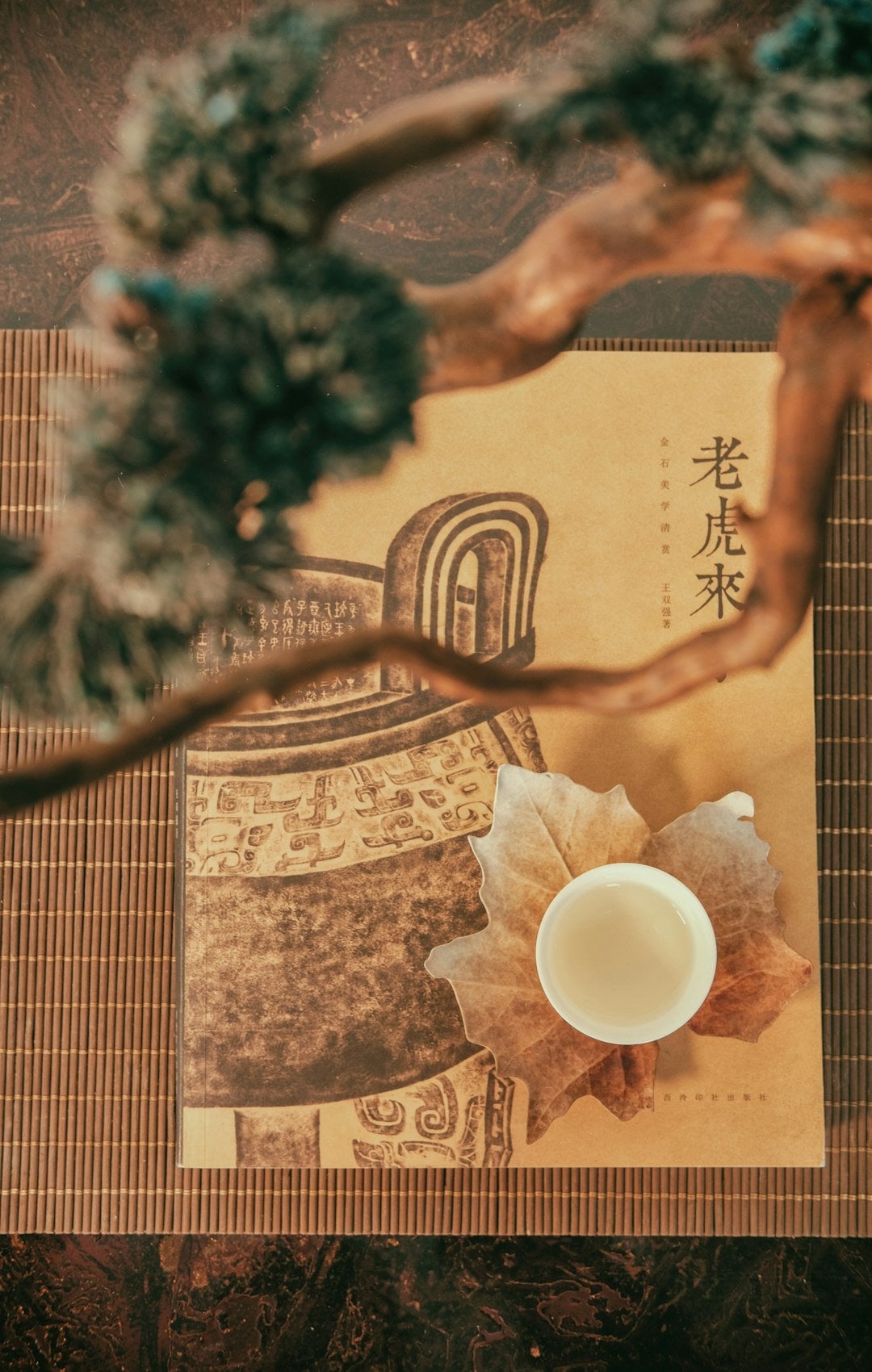 Tea and scroll still life